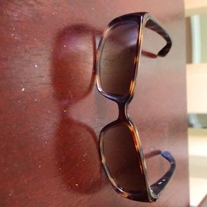 Woman’s brown sunglasses